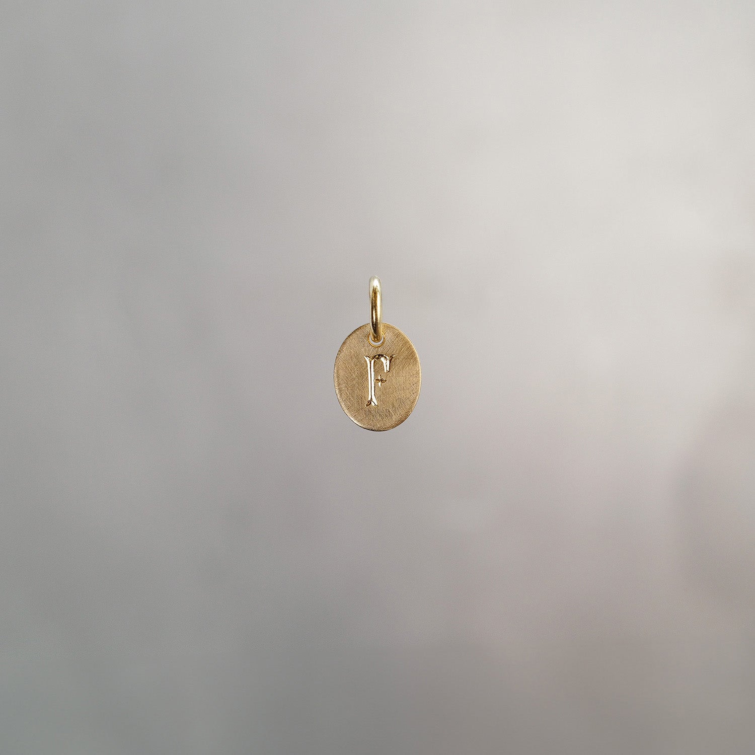 Oval Alphabet Sun Tag