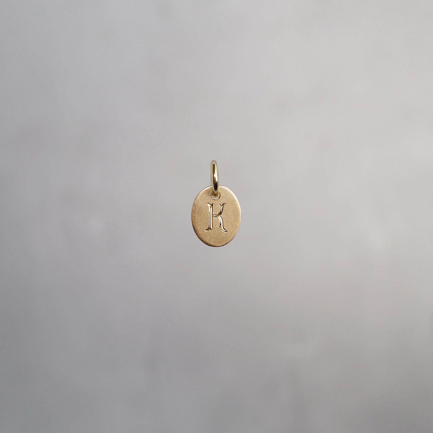 Oval Alphabet Sun Tag