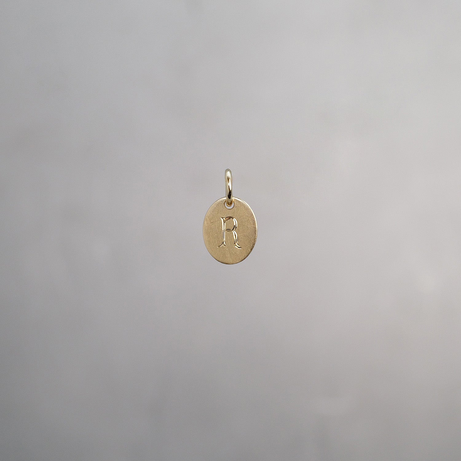 Oval Alphabet Sun Tag