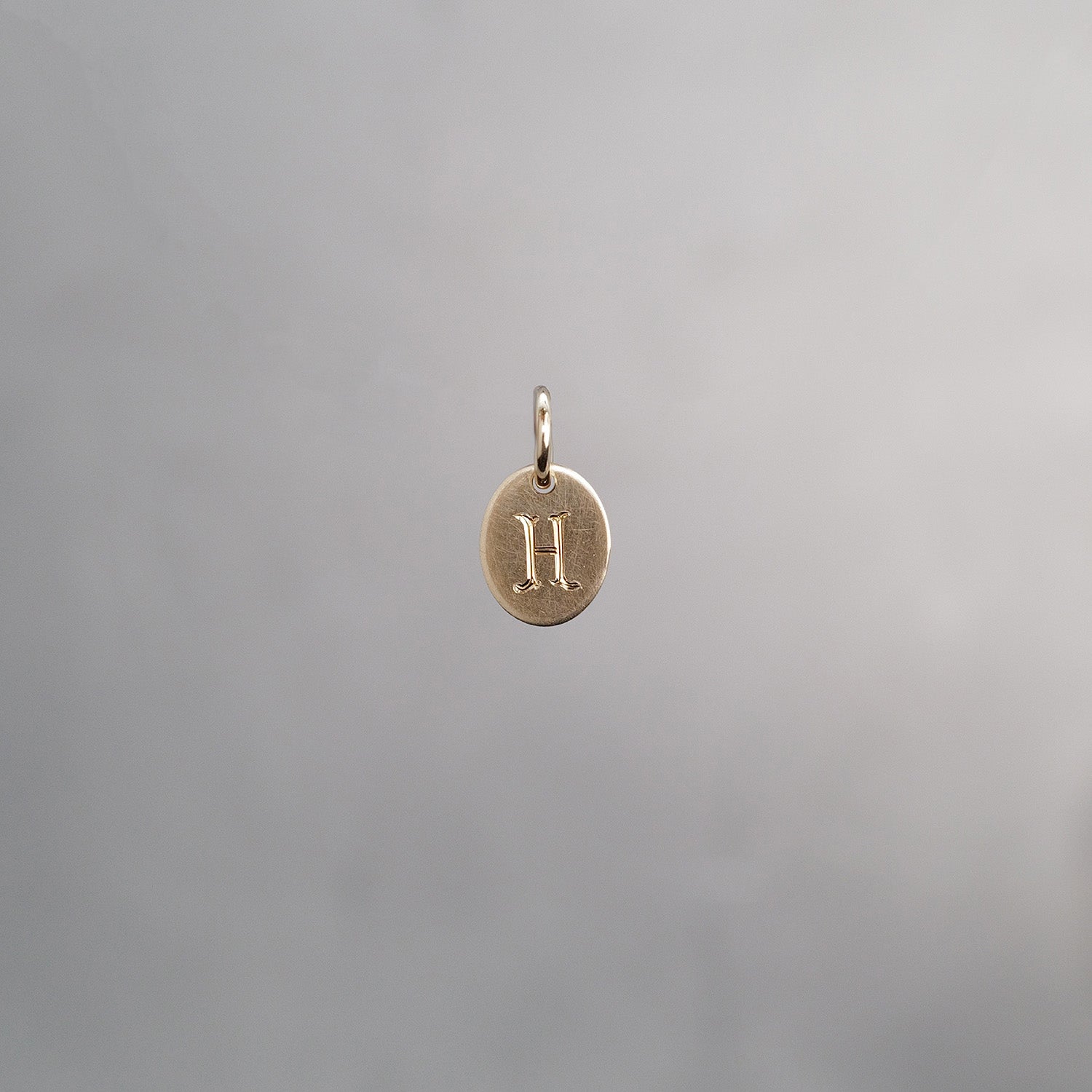 Oval Alphabet Sun Tag