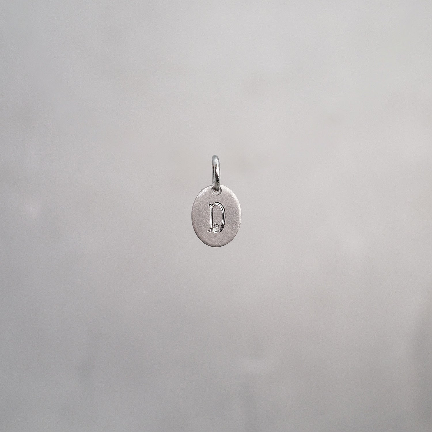 Oval Alphabet Sun Tag