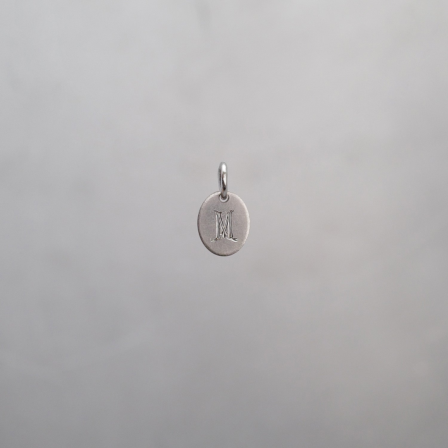 Oval Alphabet Sun Tag