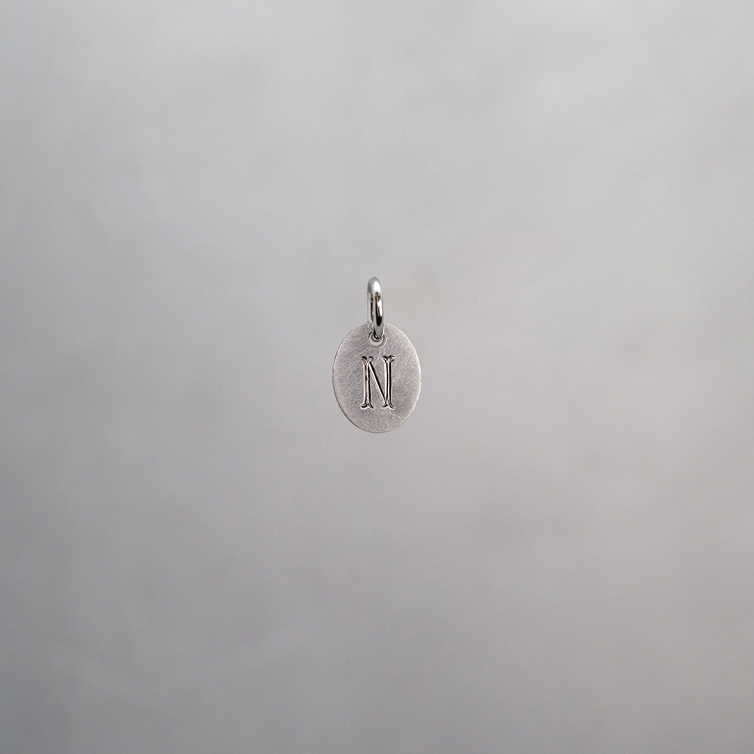 Oval Alphabet Sun Tag