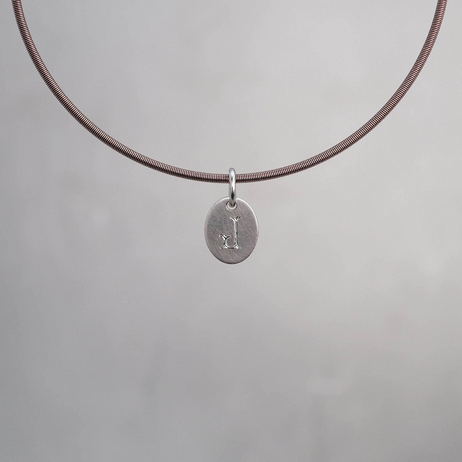 Oval Sun Tag in Platinum 950