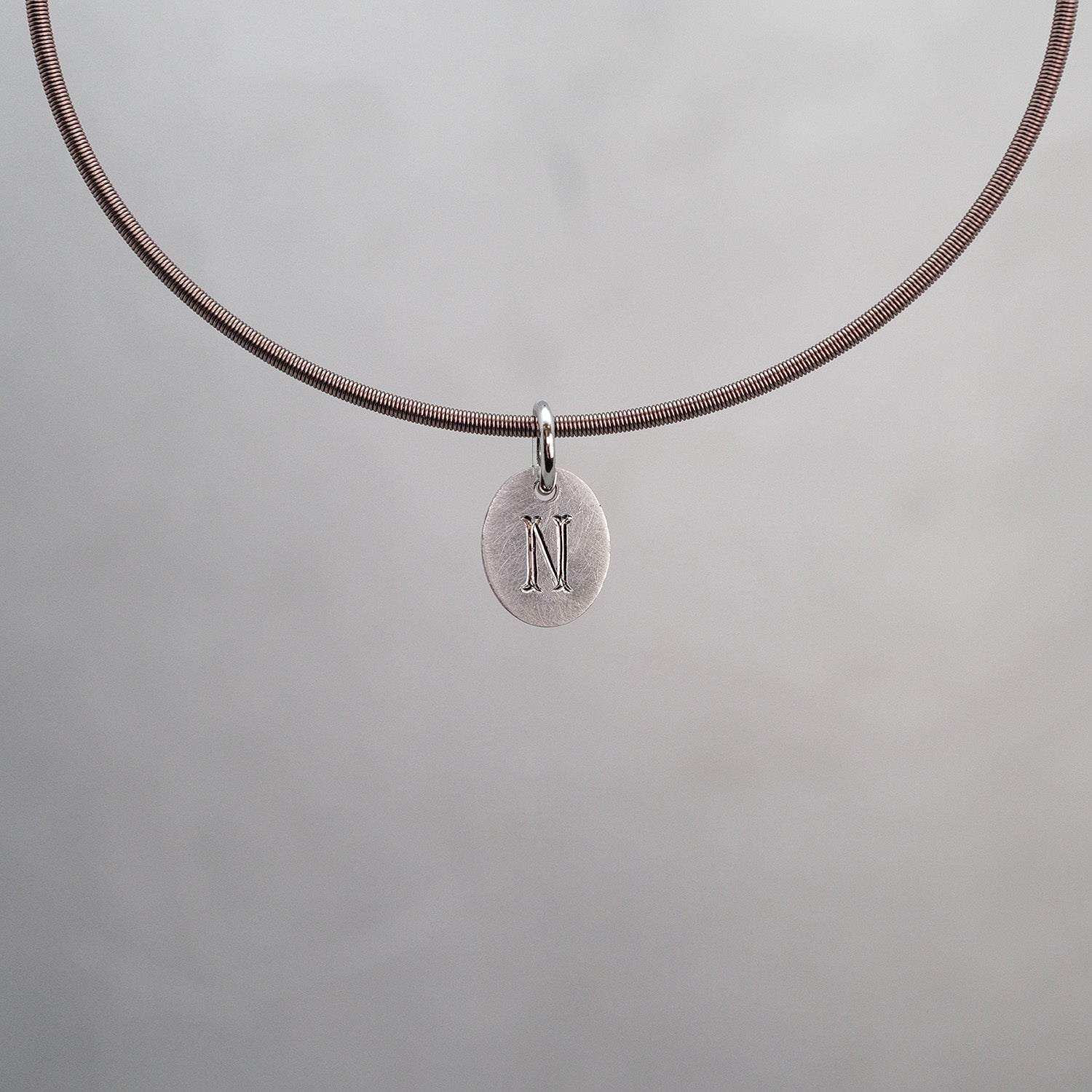 Oval Sun Tag in Platinum 950