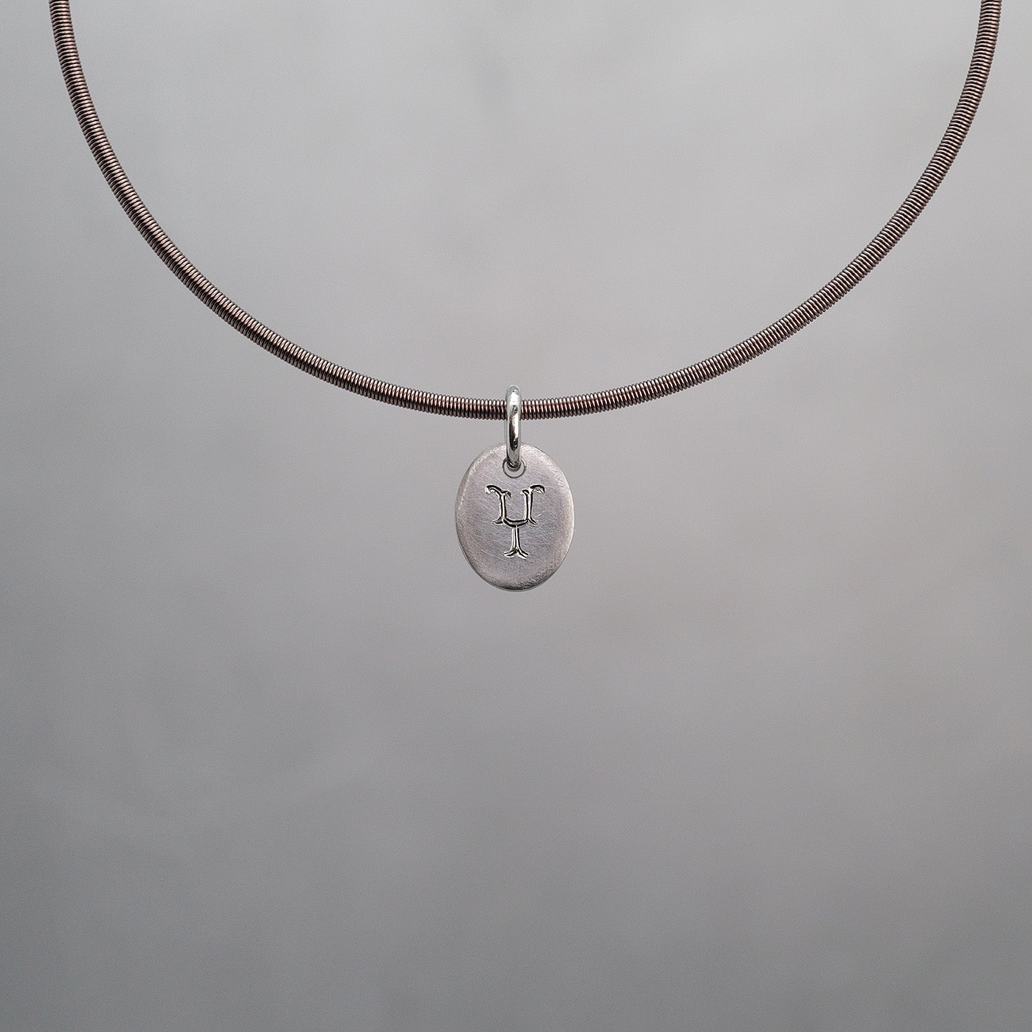 Oval Sun Tag in Platinum 950