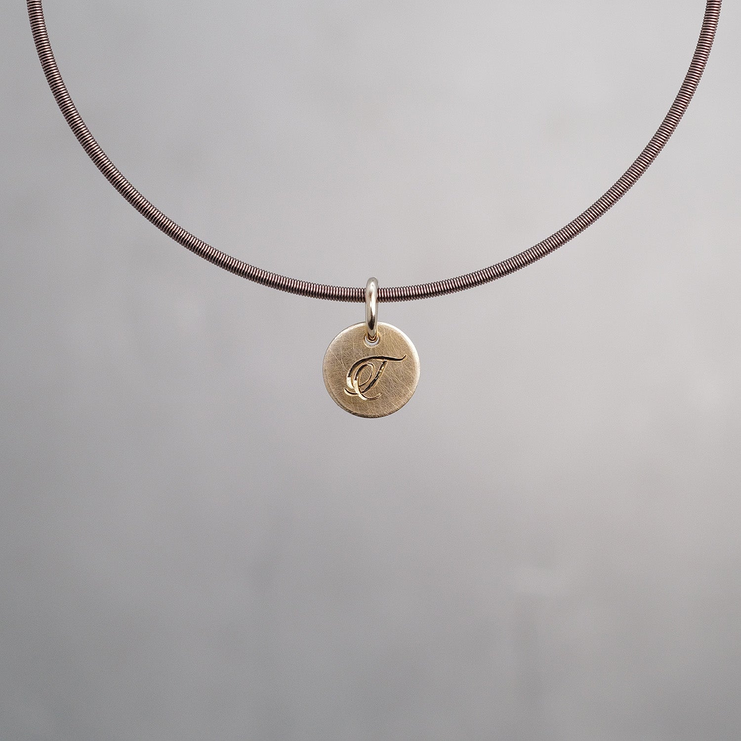 Round Sun Tag in 9K Gold