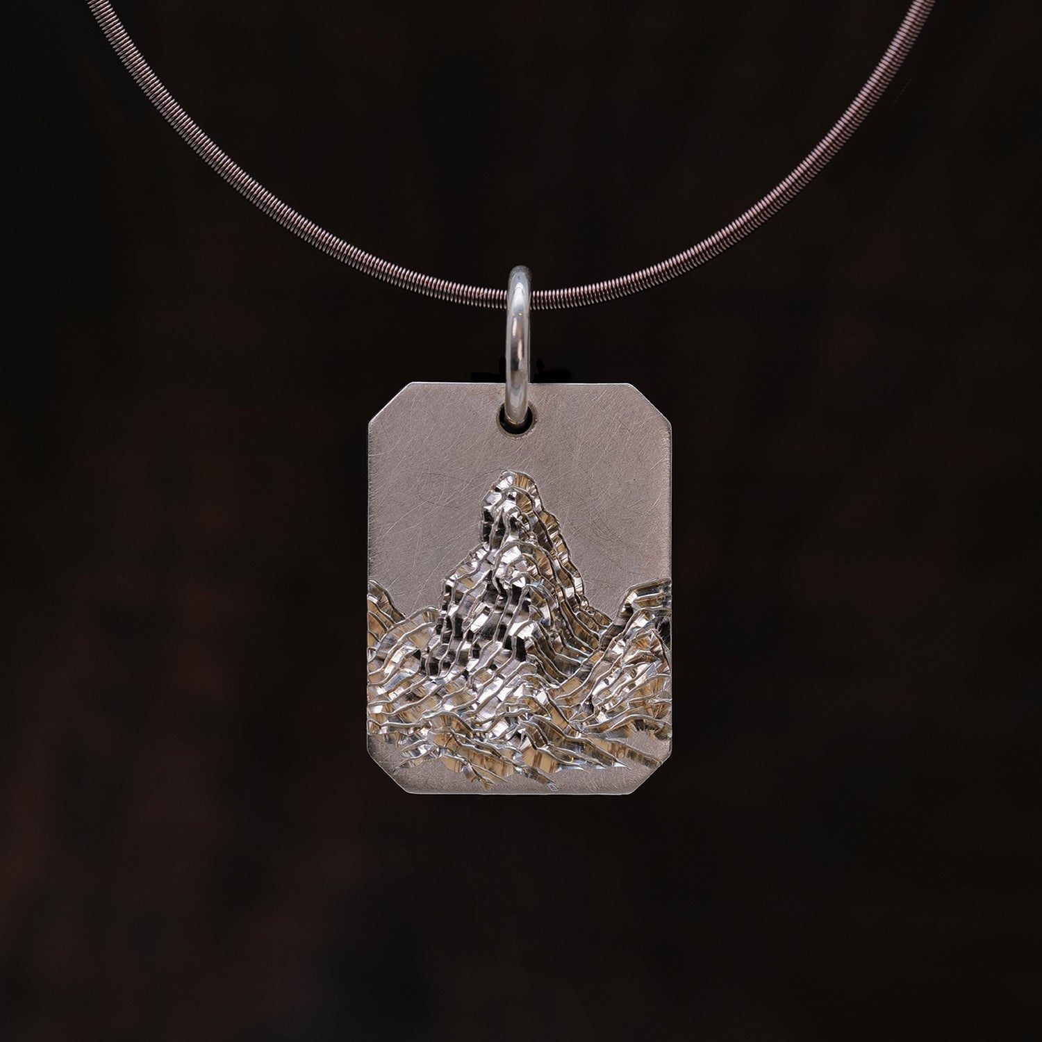 Silver Mountains & Sea Sun Tag