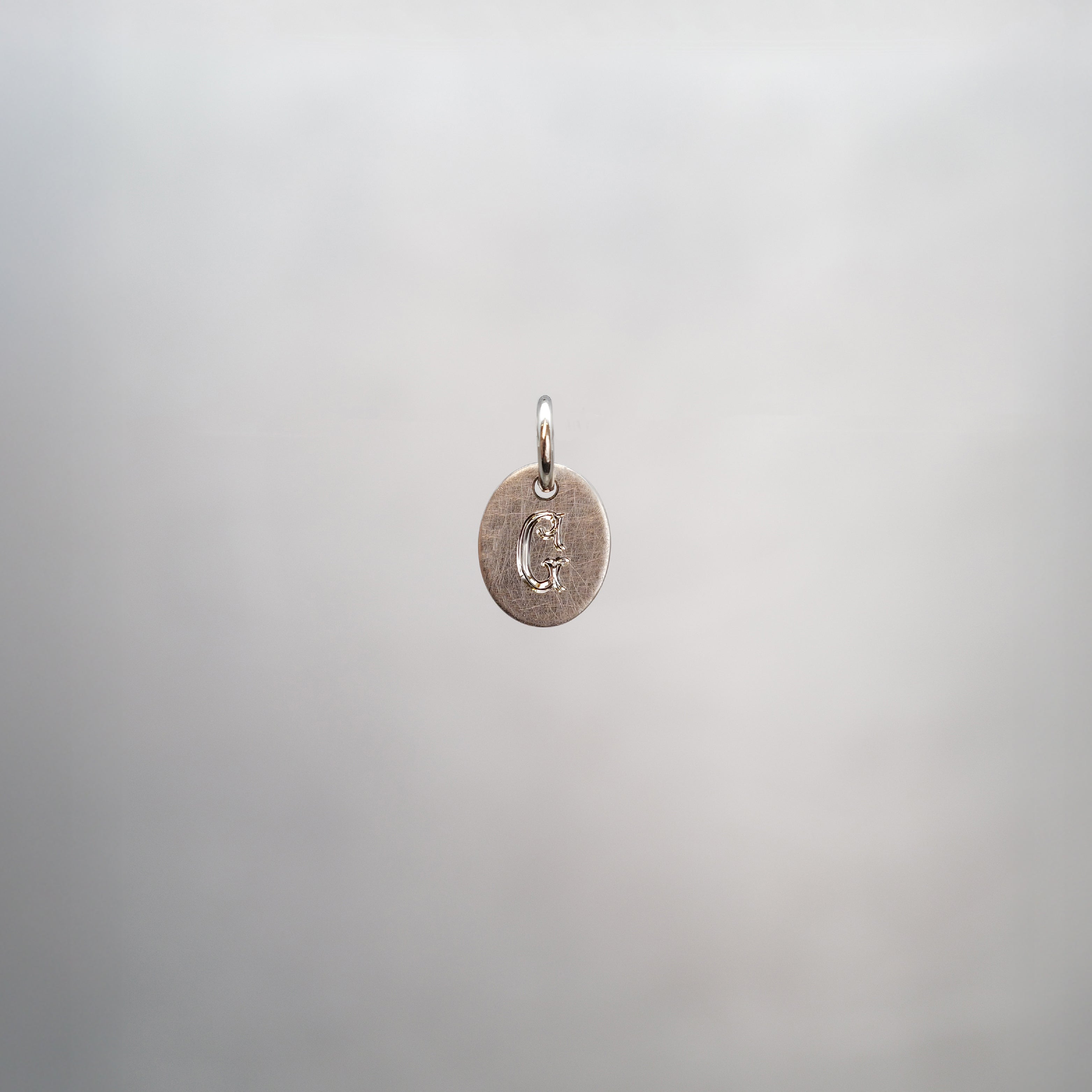 Oval Alphabet Sun Tag