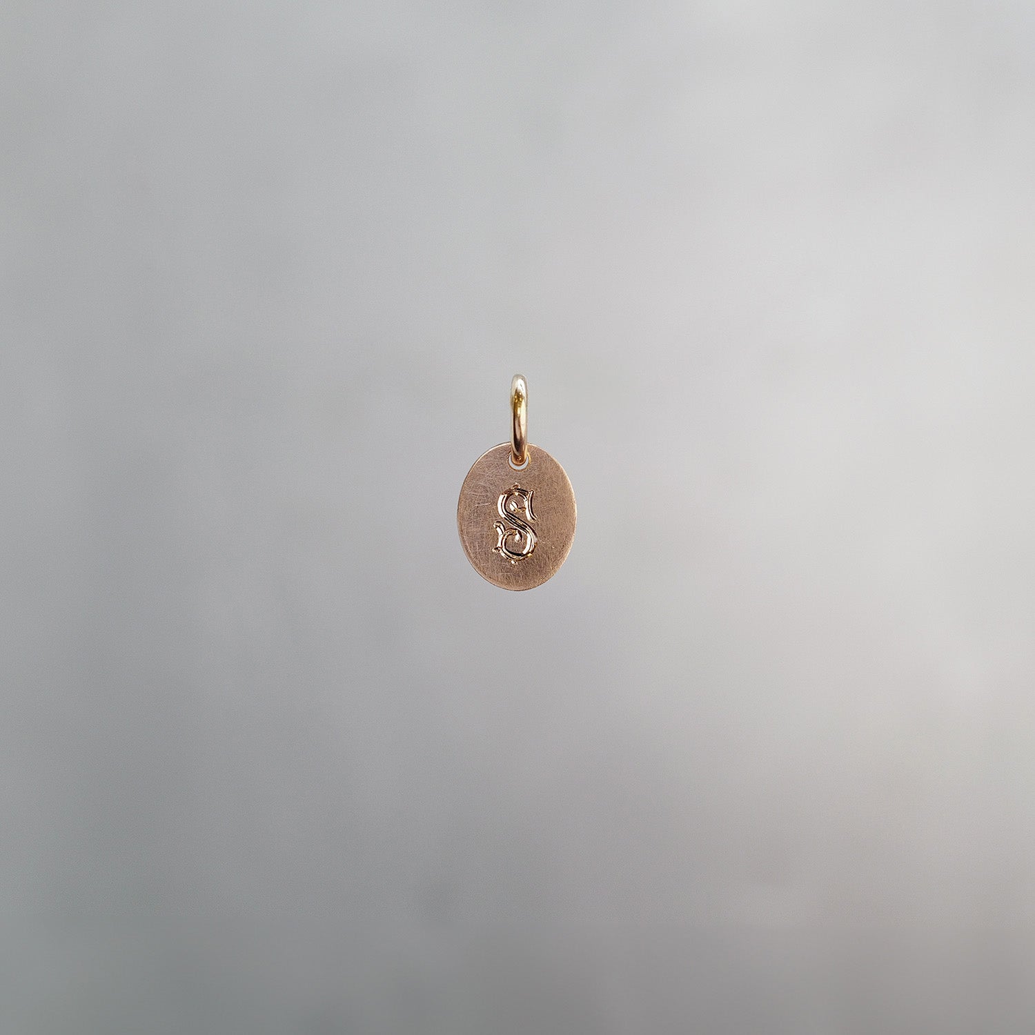 Oval Alphabet Sun Tag