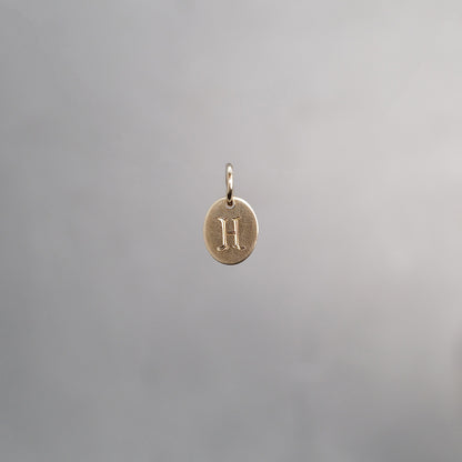 Oval Alphabet Sun Tag