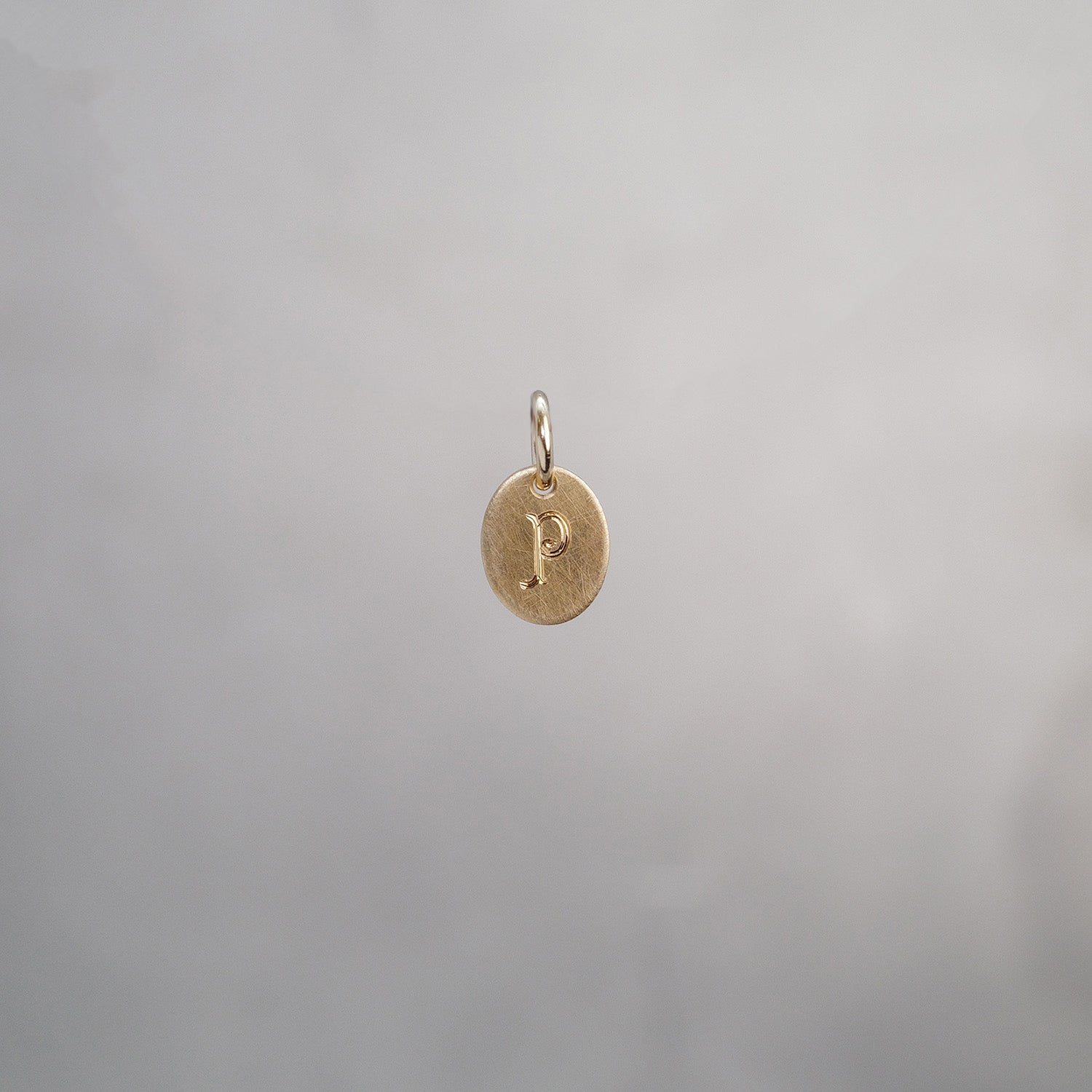 Oval Alphabet Sun Tag