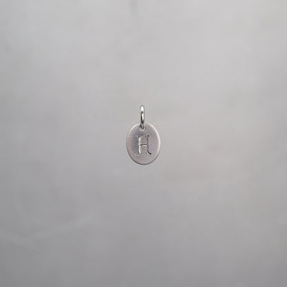 Oval Alphabet Sun Tag