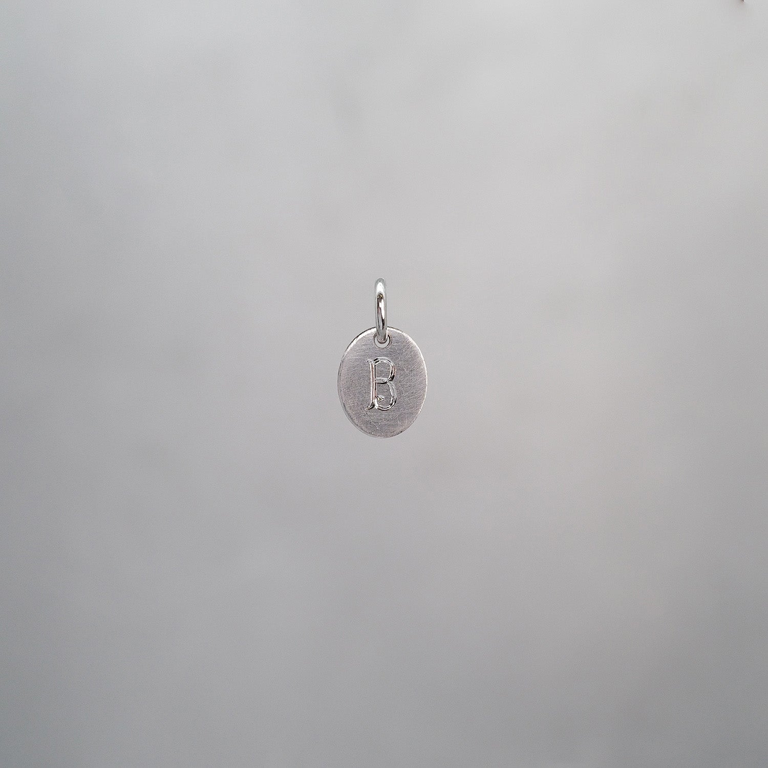 Oval Alphabet Sun Tag