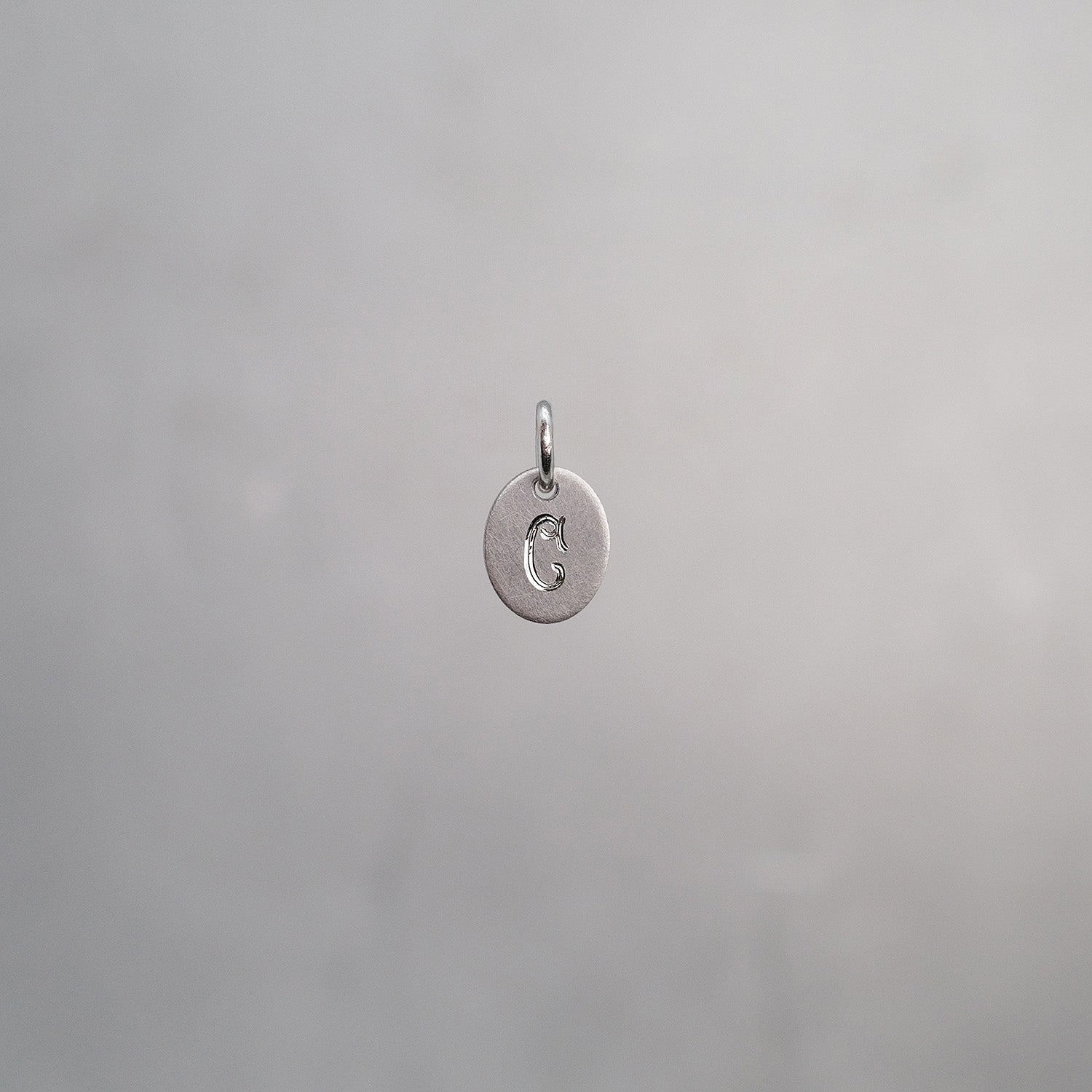 Oval Alphabet Sun Tag