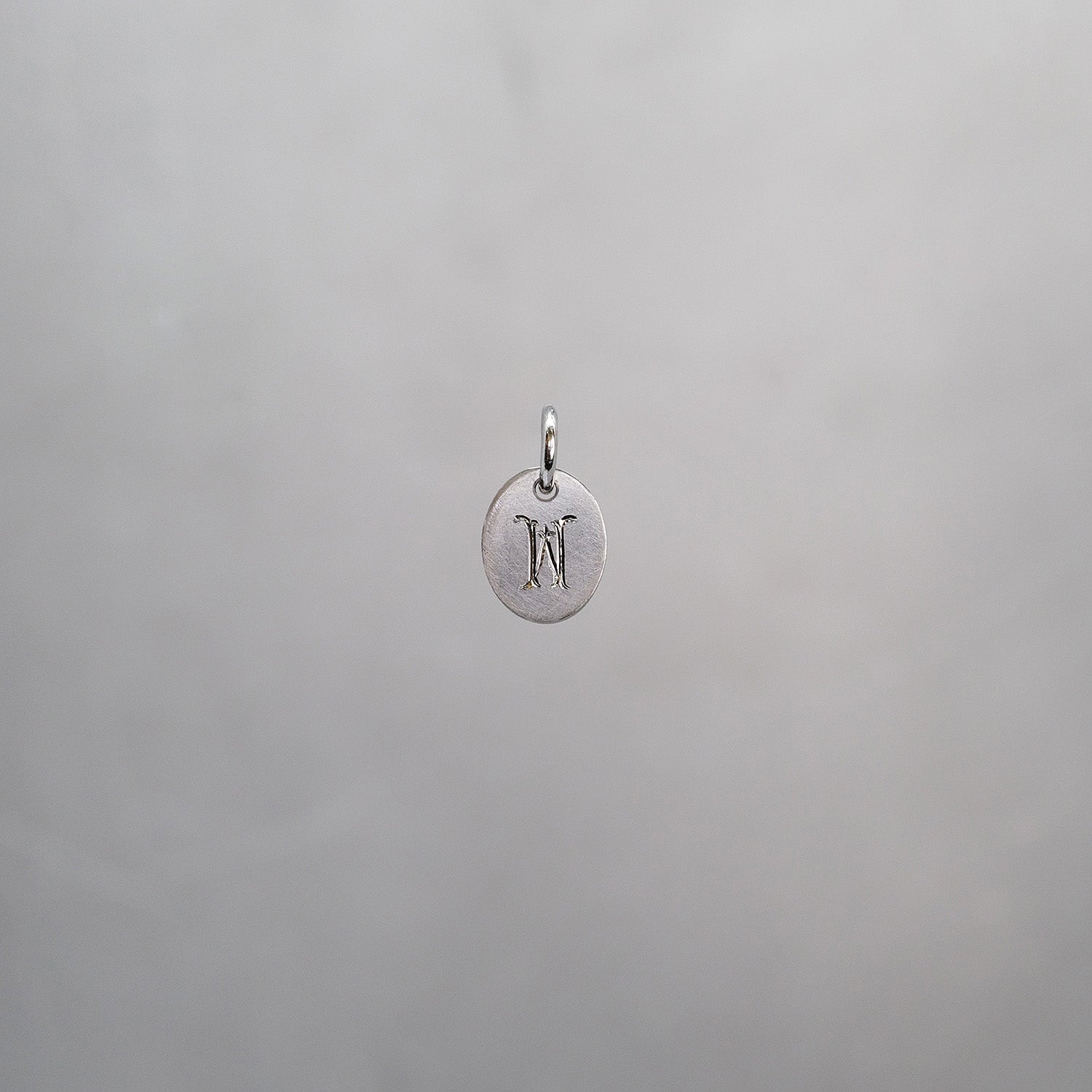 Oval Alphabet Sun Tag