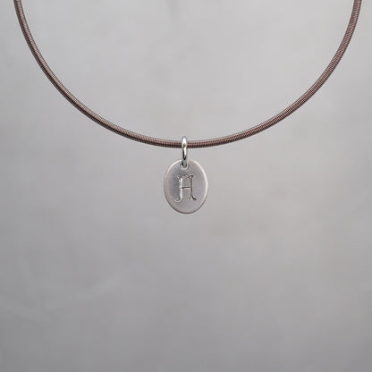 Oval Sun Tag in Platinum 950