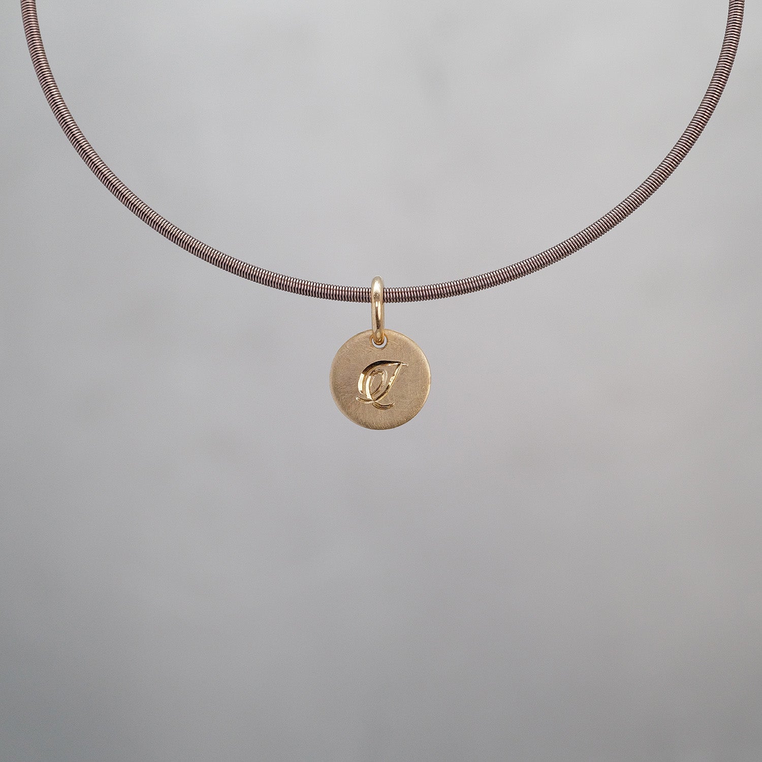 Round Sun Tag in 9K Gold