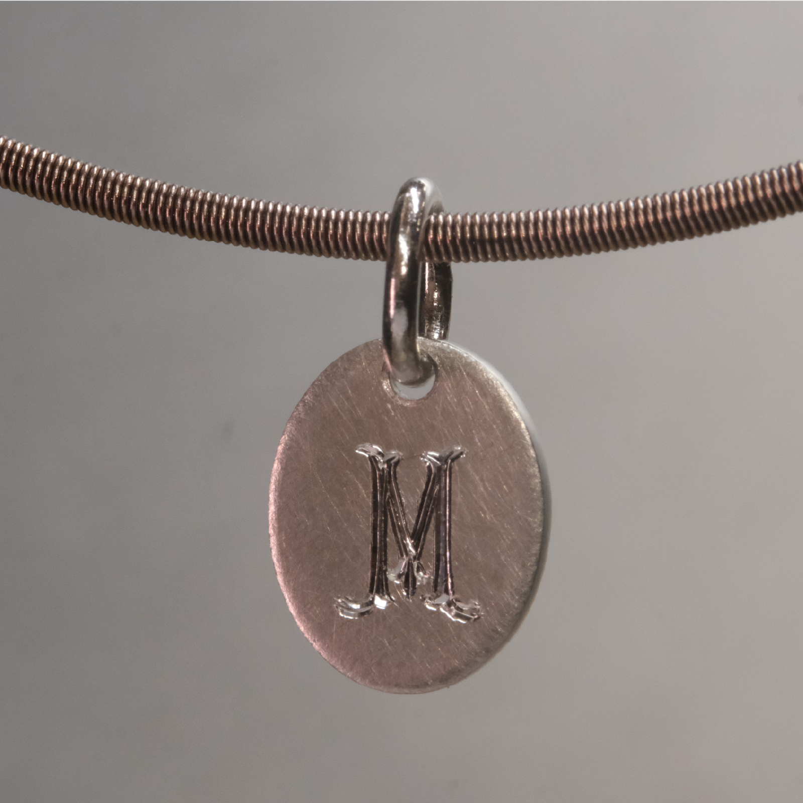 Platinum Oval Sun Tag